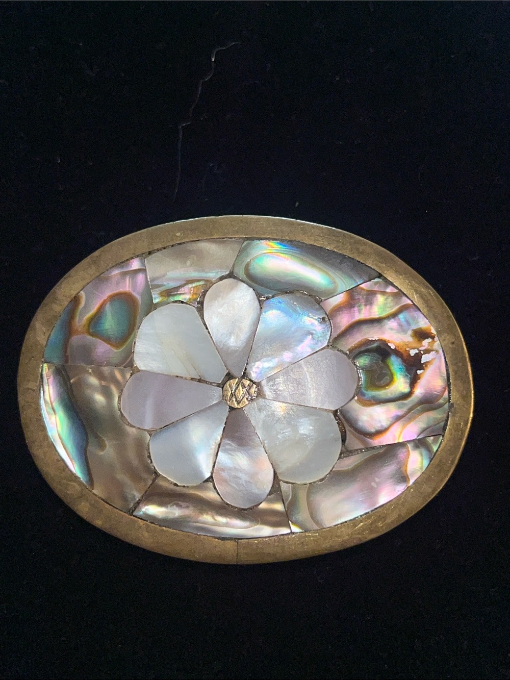 Mexican brass/silver-tone belt buckle featuring abalone shell inlay